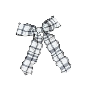 Pastel plaid bow hair clip with black and white checkered patterns and long ribbons