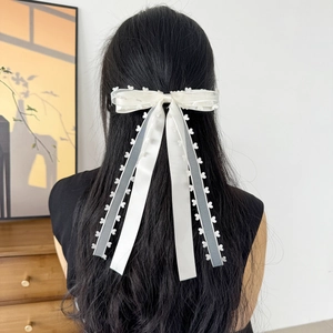 Elegant double-layered bow hair clip with lace heart embroidery and long satin ribbons