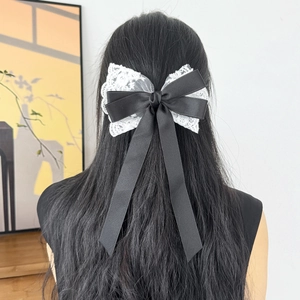 Elegant oversized French lace and black satin ribbon bow hair clip for women's hairstyle