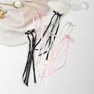 Sweet bow hair clip set with long ribbons and pearl beads for elegant hairstyles