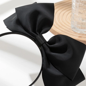 Serre-tête élégant à gros nœud noir en ruban gros-grain avec un design double couche chic