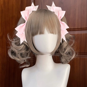 Lolita style pink satin bow headband for women featuring sweet symmetrical ribbon design