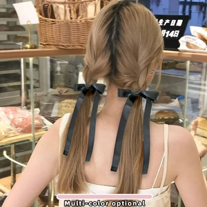 Paio di elastici per capelli con fiocchi in raso nero e lunghi nastri per acconciature