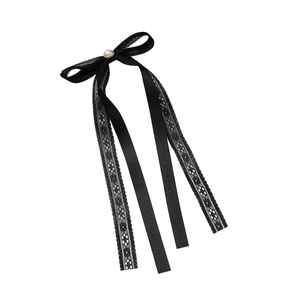 Elegant black lace bow hair clip with a gold-trimmed pearl center and long ribbon streamers