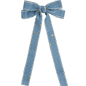 Vintage denim bow hair clip with star print and white wavy embroidery on long ribbons