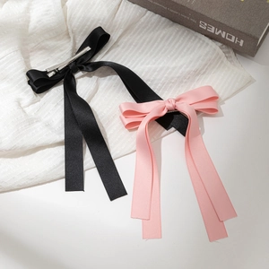 Elegant satin bow hair clips with long ribbons in black and pink for women