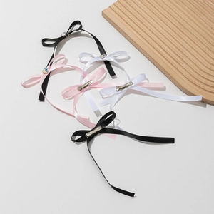 Lot de barrettes à nœuds style ballet avec cristaux cœur en noir, rose et blanc élégant
