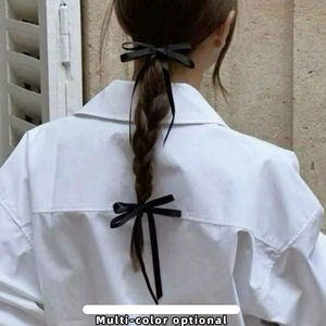 Elegant black satin bow hair clips for women in French minimalist style ribbon design
