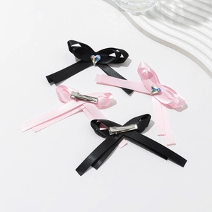 Haarspangen-Set mit rosa und schwarzen Schleifen und Herz-Kristallverzierung