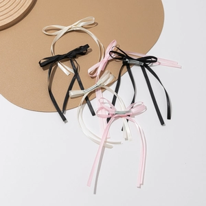 French style ribbon bow hair clips in black, beige, and pink with long hanging streamers