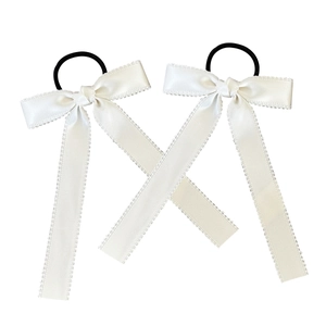 Pair of elegant white lace bow hair scrunchies with long silky satin ribbons