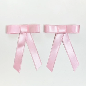 Lot de deux barrettes à nœuds en satin rose avec bords en dentelle pour femmes et filles