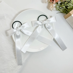 Elegant white satin ribbon bow hair ties with delicate lace trim for women