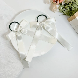 Two-piece white silk ribbon bow hair scrunchies with elegant lace trim and long streamers