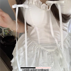 White lace ballet style top with ribbon bows and delicate ruffled floral embroidery