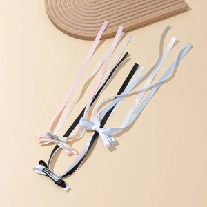 Elegant ballet style double-layered ribbon bow hair clips in four pastel colors