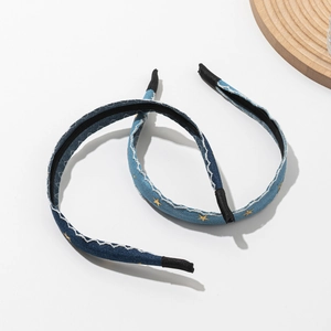 Denim star headbands in navy and light blue with yellow embroidery and wave stitching