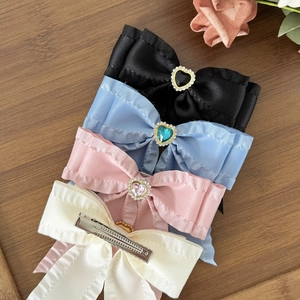 Vintage bow hair clips set with heart crystal accents in black, blue, pink, and beige