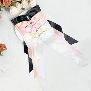 Elegant satin bow hair clips set in black, champagne, pink, and white with long ribbons