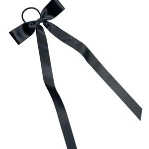 Elegant black satin bow hair tie with long ribbons for stylish ponytails and updo styles