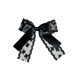 Barrette nœud en dentelle noire élégante avec motifs floraux et ruban en satin rétro