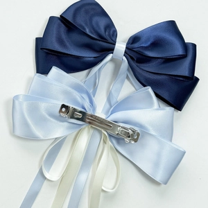 Barrettes à nœuds en satin bleu avec rubans élégants et attache à ressort en métal