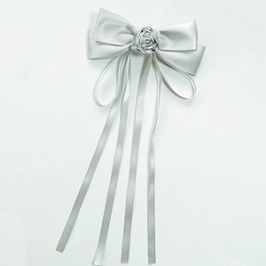 Elegant silver satin bow hair clip with metal rose flower and long flowing ribbon streamers