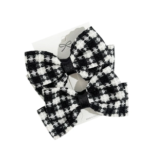 Set of two French vintage houndstooth bow hair clips with black satin center on display card