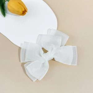 Elegant white double-layer mesh bow hair clip for women in a stylish Korean minimalist design
