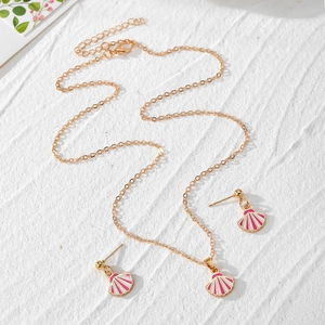 Golden alloy jewelry set with pink shell pendants including necklace and stud earrings