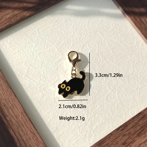 Porte-clés chat noir mignon en émail avec fermoir doré, dimensions 3,3 cm x 2,1 cm