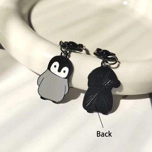 Creative penguin metal keychain set with enamel finish and textured reverse side