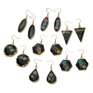 Geometric resin earrings with dried flowers, gold leaf, and stainless steel hooks