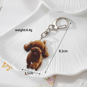 Detail of cute acrylic brown poodle dog keychain with measurements showing 8.2cm total length