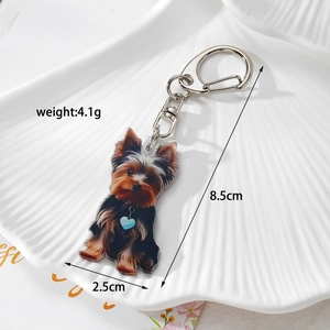 Detail view of acrylic Yorkshire Terrier keychain with dimensions of 8.5cm by 2.5cm