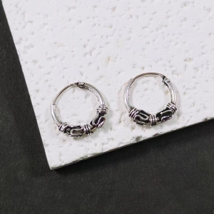 Vintage silver small hoop earrings for men with ethnic style embossed wave pattern