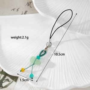 Detail shot of pale green jade-style gourd pendant with size 10.5cm and weight 2.1g info