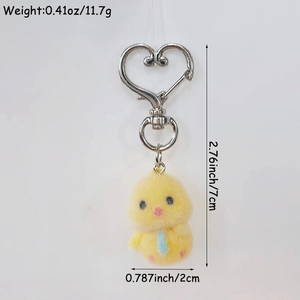 Cute yellow flocked chick keychain with heart clasp and striped tie on white background