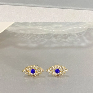 Boucles d'oreilles œil maléfique vintage avec plaquage or et strass étincelants