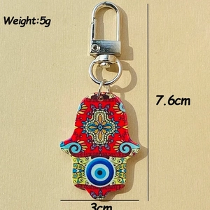 Portachiavi Mano di Fatima in acrilico con occhio blu e motivo mandala rosso, 7.6cm