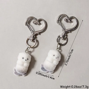 Cute fluffy otter keychain with heart-shaped metal clasp for bags and key accessories