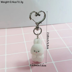 Cute white flocked bunny keychain with silver heart clasp and detailed size measurements