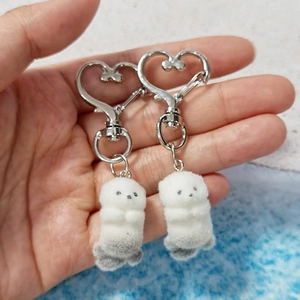 Cute flocked otter plush keychain with heart metal ring and soft fur texture