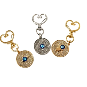 Set portachiavi Occhio del Male con pavé di cristalli e chiusura a forma di cuore