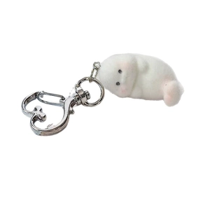 Cute white flocked seal keychain with silver heart-shaped carabiner for bag decoration