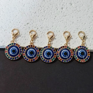 Set of five Evil Eye charms with colorful rhinestones and gold-tone lobster clasps