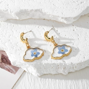 Handmade cloud resin earrings with blue real dried flowers and golden crescent hooks