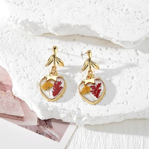 Handmade resin heart earrings with real red and yellow dried flowers in gold frame