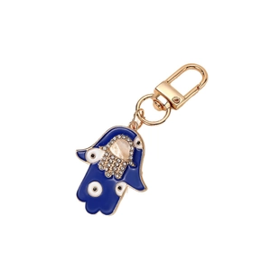 Vintage Hamsa Hand keychain with blue evil eye charms and sparkling crystals