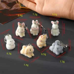 Vue détaillée des porte-clés lapin floqués montrant les dimensions et le poids de chacun